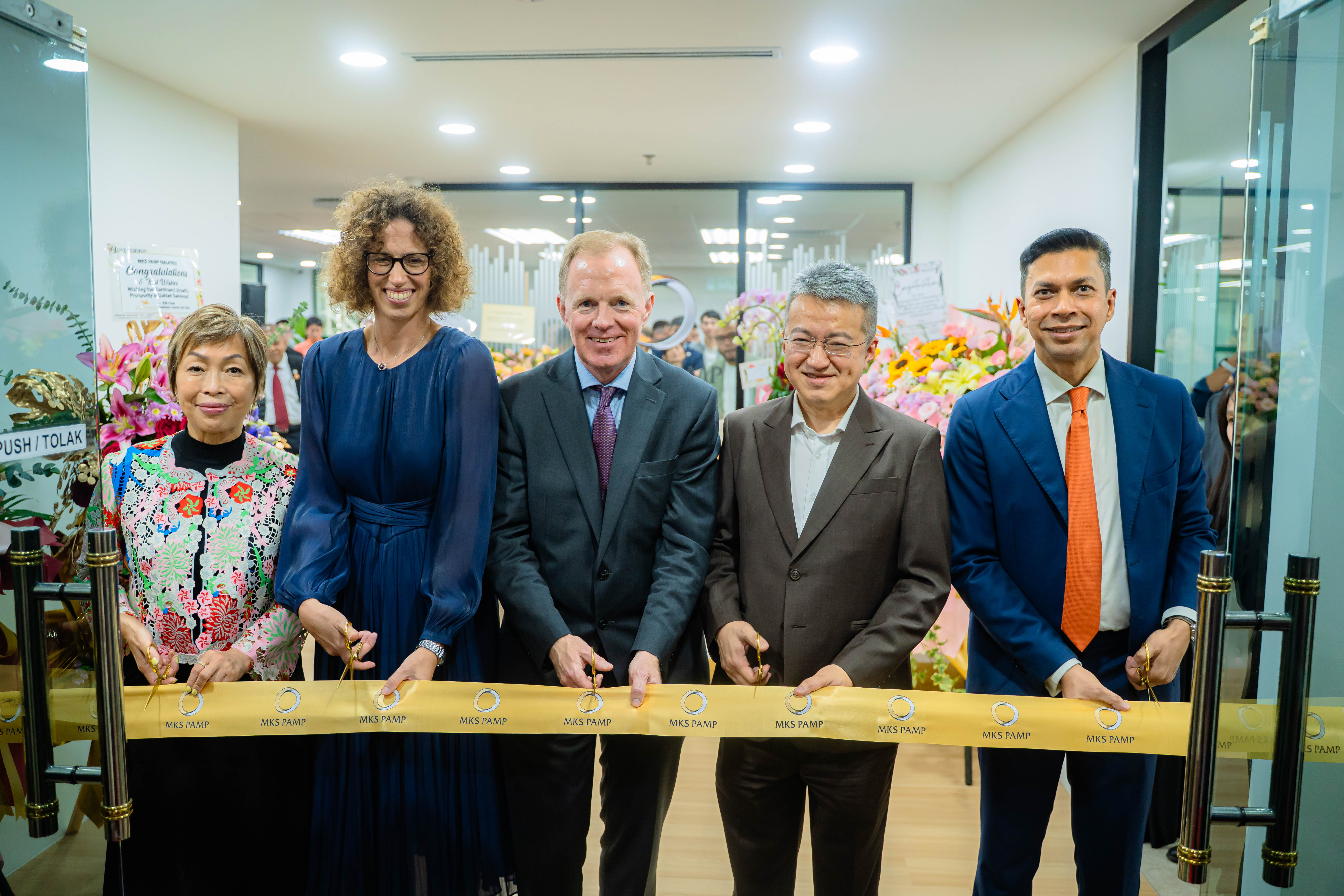 Ribbon-cutting (from left to right): Ms. Ann Kung, Chair of MKS PAMP (Hong Kong) Limited & Asia-Pacific;  Her Excellency Chantal Moser, Ambassador of Switzerland to Malaysia; Mr. James Emmett, CEO of MKS PAMP;  Mr. YB Tuan Liew Chin Tong, Malaysia’s Deputy Minister of Finance; and Mr. Segar Govindasamy, Managing Director of MKS PAMP Malaysia.